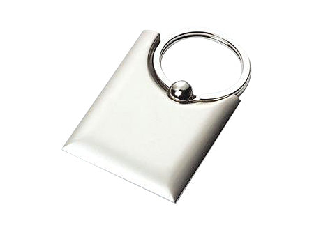 Llavero de metal acabado satinado, diseño que evoca una "Bolsa", presentacion estuche negro. Set de 12 unidades