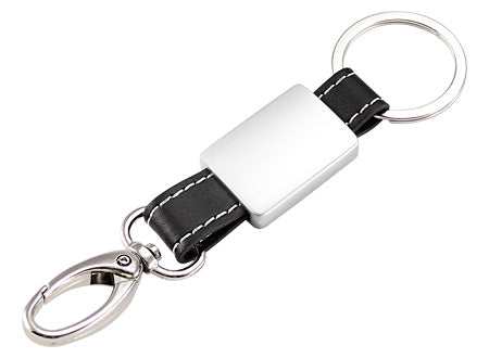 Llavero de estilo "Thoop" que combina metal y cuero, presentado en un estuche negro. Set de 12 unidades