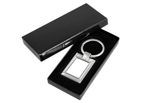 Llavero metálico con rectángulo blanco para sublimación, presentacion estuche negro. Set de 12 unidades