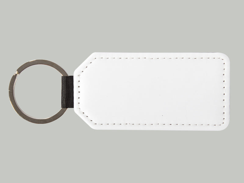 Llavero rectangular modelo bandera en PU blanco, reverso negro, para sublimacion