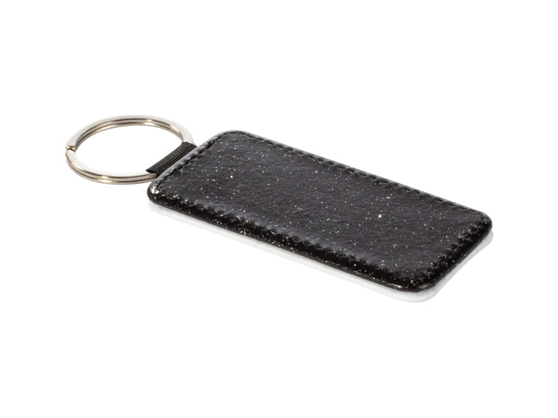 Llavero rectangular sublimación con PU blanco. Presentacion bolsita transparente